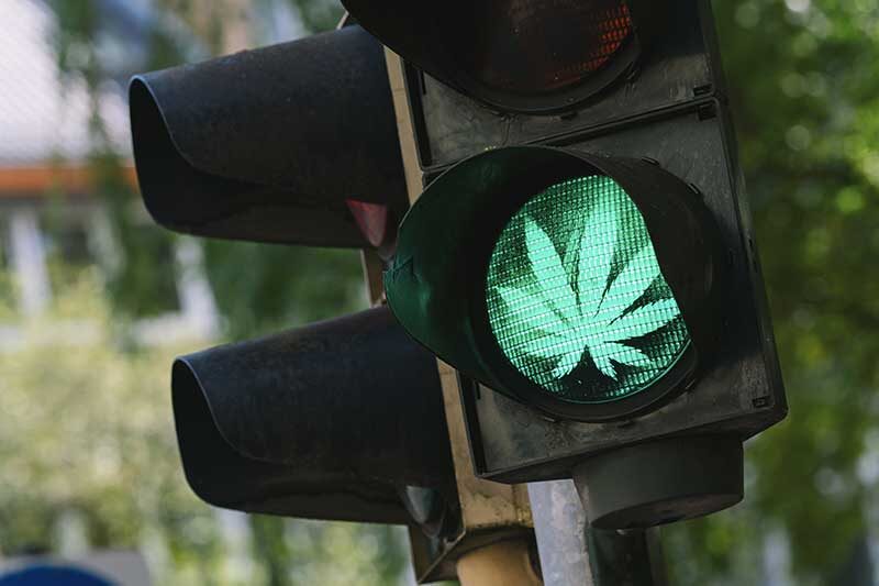 | Roots Rx traffic light with Marijuana or cannabis sign - use cannabis safely concept